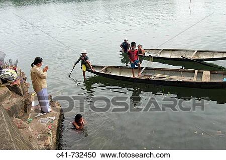 Stock Image - Buddhist ceremony on Perfume River, Hue, Vietnam. Fotosearch