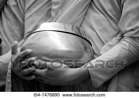 Buddhist monks begging in Cambodia View Large Photo Image Stock Image - Buddhist monks begging in Cambodia. Fotosearch