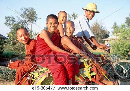 Buddhist monks in Inle. Myanmar View Large Photo Image Stock Photo - Buddhist monks in Inle. Myanmar. Fotosearch