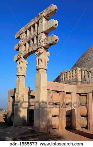 Stock Image - Buddhist monuments: torana of big stupa 1st century AD, UNESCO World Heritage site, Sanchi, India. Fotosearch