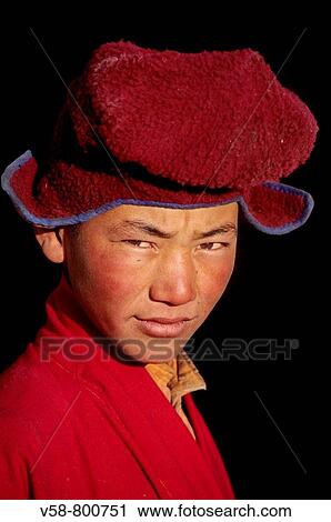 Stock Image - BUDDHIST NOVICE, SANI MONASTERY, ZANSKAR, INDIA. Fotosearch