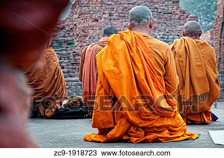 Budhist monks praying in the Dhamekh stupa, Sarnath, Uttar Pradesh, India View Large Photo Image Stock Image - Budhist monks praying in the Dhamekh stupa, Sarnath, Uttar Pradesh, India. Fotosearch