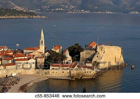 Stock Photograph - Budva, old town peninsula, Cathedral of St John, Bell tower, fortification walls, Adriatic coast, Monte. Fotosearch