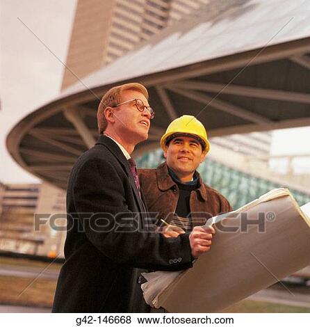 Builder and client View Large Photo Image Stock Photo - Builder and client. Fotosearch