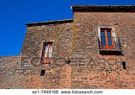 Stock Photo - building with balconies, Palou, La Segarra, Catalonia, Spain.. Fotosearch