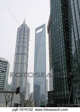 Stock Image - Buildings in a city, Lujiazui, The Bund, Shanghai, China. Fotosearch