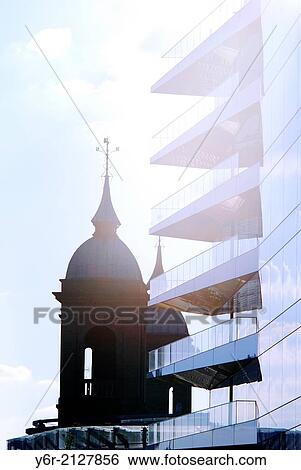 Buildings in the City of London, England, on the banks of the River Thames caught in strong evening sunlight. View Large Photo Image Stock Photograph - Buildings in the City of London, England, on the banks of the River Thames caught in strong evening sunlight.. Fotosearch