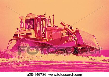 Stock Photograph - Bulldozer in sea. Fotosearch