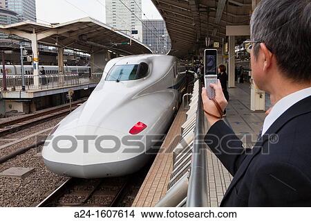 Bullet train at Tokyo Station, Tokyo, Japan View Large Photo Image Picture - Bullet train at Tokyo Station, Tokyo, Japan. Fotosearch
