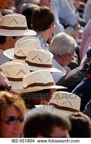 Bullfight spectators with hats. Real Maestranza de Sevilla. Andalucia. Spain. View Large Photo Image Picture - Bullfight spectators with hats. Real Maestranza de Sevilla. Andalucia. Spain.. Fotosearch