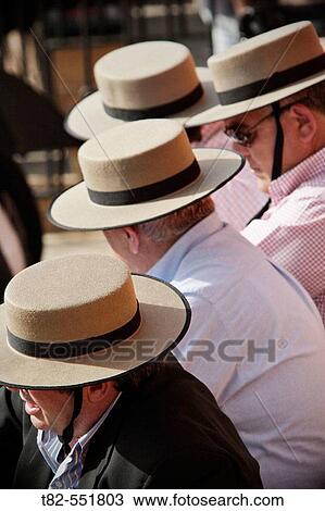 Bullfight spectators with typical hats. Real Maestranza de Sevilla. Andalucia. Spain. View Large Photo Image Stock Image - Bullfight spectators with typical hats. Real Maestranza de Sevilla. Andalucia. Spain.. Fotosearch