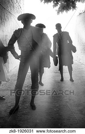 Bullfighters waiting for the exit to the bullring in the alley, Andujar, Spain View Large Photo Image Stock Image - Bullfighters waiting for the exit to the bullring in the alley, Andujar, Spain. Fotosearch