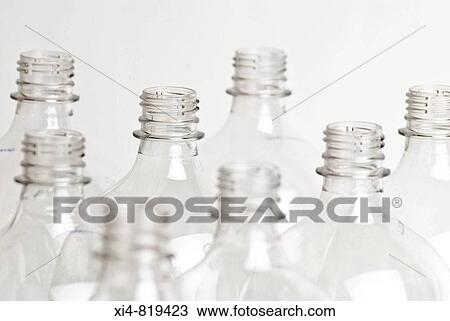 Bunch of clean pet bottes in white background View Large Photo Image Stock Image - Bunch of clean pet bottes in white background. Fotosearch
