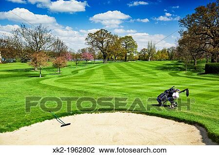 Bunker and golf bag near Wimbledon, London, UK View Large Photo Image Stock Image - Bunker and golf bag near Wimbledon, London, UK. Fotosearch