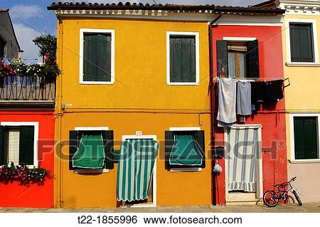 Stock Photograph - Burano Italy Facades typical colors of the houses on the island of Burano. Fotosearch
