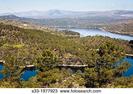 Burguillo reservoir and the Sierra de Gredos. Avila. Castilla Leon. Spain. View Large Photo Image Stock Image - Burguillo reservoir and the Sierra de Gredos. Avila. Castilla Leon. Spain.. Fotosearch