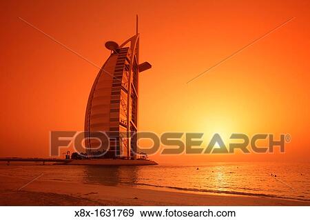 Burj Al Arab hotel at sunset, Dubai, United Arab Emirates UAE View Large Photo Image Stock Photo - Burj Al Arab hotel at sunset, Dubai, United Arab Emirates UAE. Fotosearch