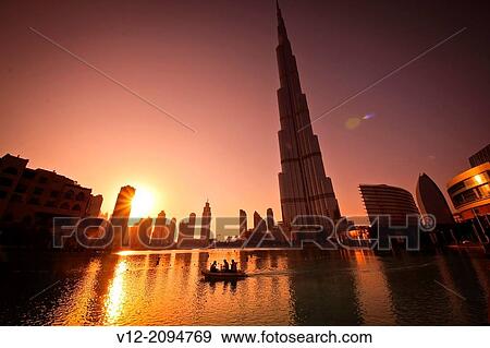 Burj Khalifa, Burj Dubai, the tallest building in the world in downtown Dubai at sunset View Large Photo Image Stock Photo - Burj Khalifa, Burj Dubai, the tallest building in the world in downtown Dubai at sunset. Fotosearch