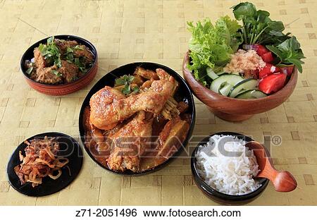 Stock Photograph - Burmese meal, curries, rice, salad,.. Fotosearch