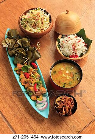 Burmese meal, fish, fish soup, salad, rice, balachaung,. View Large Photo Image Picture - Burmese meal, fish, fish soup, salad, rice, balachaung,.. Fotosearch