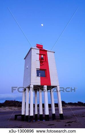 Burnham-on-Sea Lighthouse at dusk with the moon shining overhead Somerset, England, United Kingdom View Large Photo Image Stock Photograph - Burnham-on-Sea Lighthouse at dusk with the moon shining overhead Somerset, England, United Kingdom. Fotosearch
