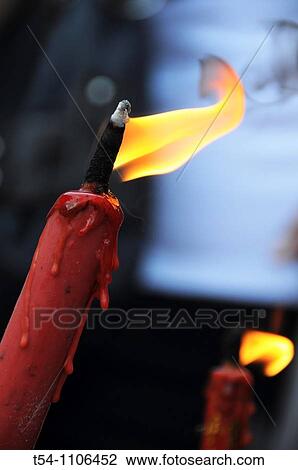 Burning Candle at a Buddhist Temple in Bangkok View Large Photo Image Stock Image - Burning Candle at a Buddhist Temple in Bangkok. Fotosearch
