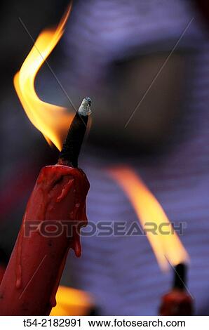Burning candles in a temple in Bangkok View Large Photo Image Stock Image - Burning candles in a temple in Bangkok. Fotosearch