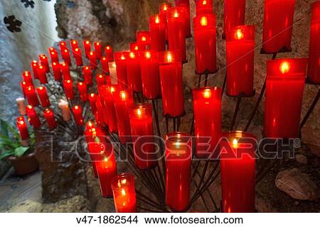 Burning candles in honor of the Virgen del Castell de Agres, Alicante, Spain, Europe View Large Photo Image Picture - Burning candles in honor of the Virgen del Castell de Agres, Alicante, Spain, Europe. Fotosearch