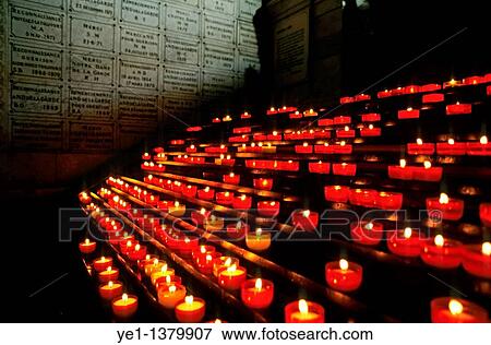 Burning candles inside the crypt at Notre-Dame de la Garde, Marseille, France View Large Photo Image Stock Photo - Burning candles inside the crypt at Notre-Dame de la Garde, Marseille, France. Fotosearch