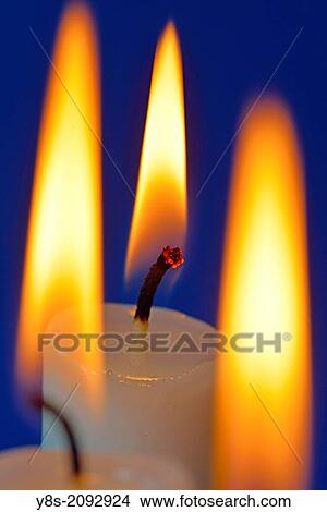 Picture - Burning Candles.. Fotosearch