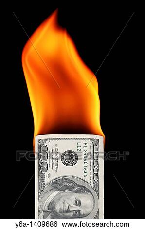 Stock Photograph - Burning one hundred dollar bill. Fotosearch