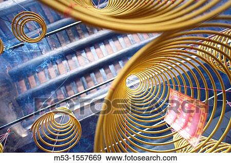 Burning spiral joss incense at Tin Hau Temple Taipa Village Macau China View Large Photo Image Stock Photo - Burning spiral joss incense at Tin Hau Temple Taipa Village Macau China. Fotosearch