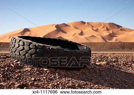 Burst wheels at te road, Ghat, Libia View Large Photo Image Stock Photograph - Burst wheels at te road, Ghat, Libia. Fotosearch