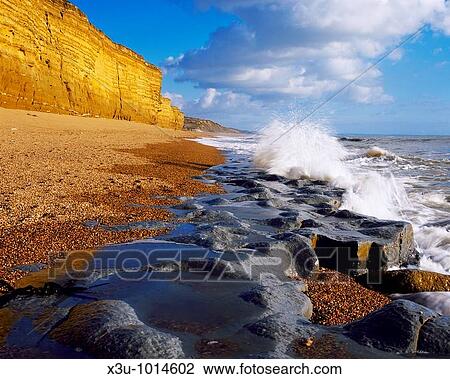 Burton Beach at Burton Bradstock on the Dorset Jurassic Coast, near Bridport, Dorset, England, United Kingdom View Large Photo Image Stock Image - Burton Beach at Burton Bradstock on the Dorset Jurassic Coast, near Bridport, Dorset, England, United Kingdom. Fotosearch