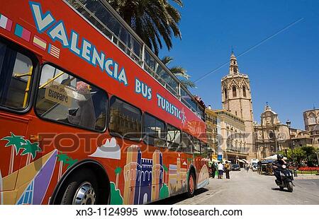 Bus tourist, on background? Miquelet? or? Miguelete? tower (built in 14th century), Cathedral. Valencia. Spain. View Large Photo Image Stock Photography - Bus tourist, on background? Miquelet? or? Miguelete? tower (built in 14th century), Cathedral. Valencia. Spain.. Fotosearch