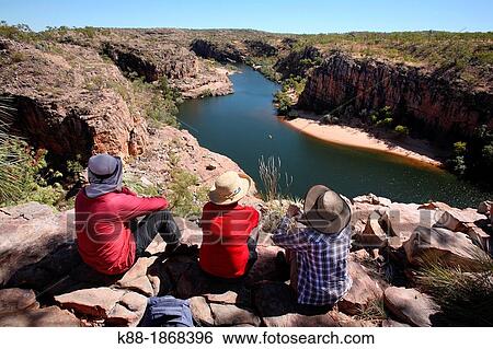 Stock Photograph - Bushwalkers at Katherine Gorge in Nitmiluk National Park Northern territory, Australia. Fotosearch