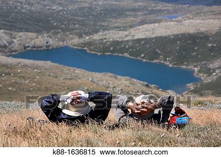 Bushwalkers resting in the Australian Alps Kosciuszko National Park, New South Wales View Large Photo Image Stock Photography - Bushwalkers resting in the Australian Alps Kosciuszko National Park, New South Wales. Fotosearch