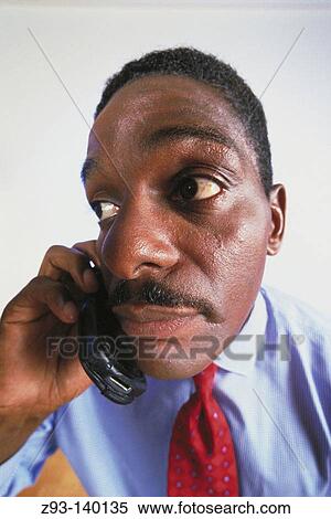 Businesman on cell phone View Large Photo Image Stock Photography - Businesman on cell phone. Fotosearch