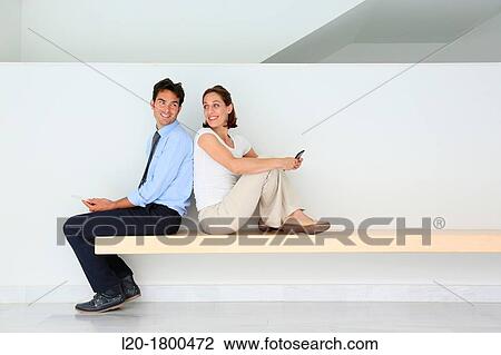 Stock Image - Business couple. Fotosearch