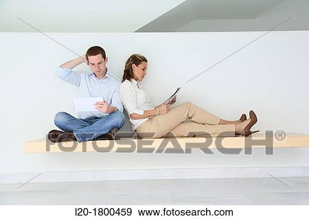 Stock Photo - Business couple. Fotosearch