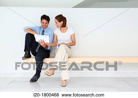 Business couple View Large Photo Image Stock Photo - Business couple. Fotosearch