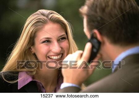 Business man and woman outdoors View Large Photo Image Stock Photo - Business man and woman outdoors. Fotosearch