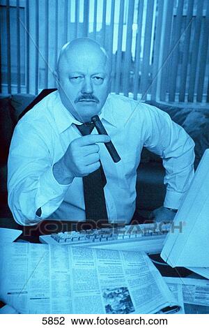 Business man in office View Large Photo Image Stock Image - Business man in office. Fotosearch