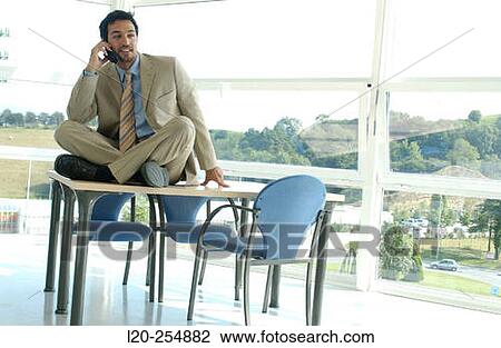 Business man on cell phone View Large Photo Image Stock Image - Business man on cell phone. Fotosearch