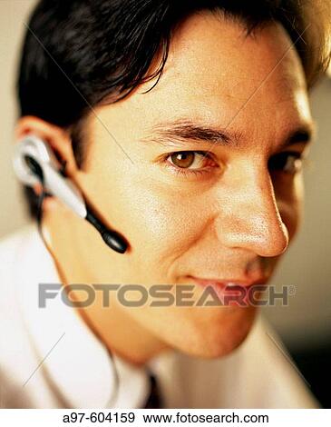 Stock Photo - Business man telemarketing. Fotosearch