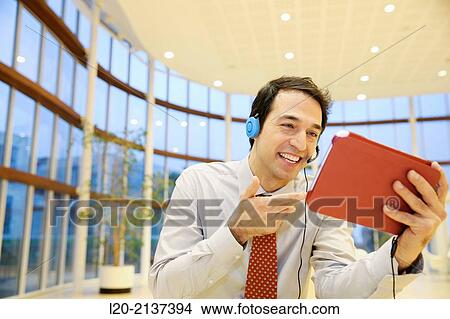 Business man with digital tablet View Large Photo Image Picture - Business man with digital tablet. Fotosearch