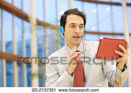 Business man with digital tablet View Large Photo Image Stock Image - Business man with digital tablet. Fotosearch