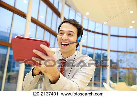 Business man with digital tablet View Large Photo Image Stock Image - Business man with digital tablet. Fotosearch