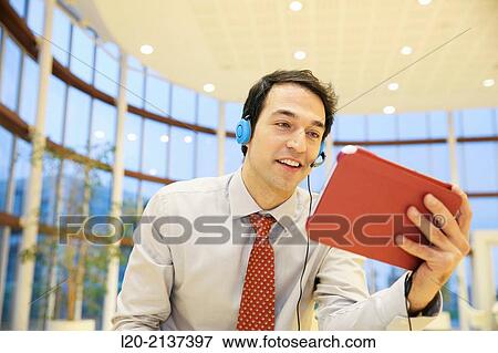 Business man with digital tablet View Large Photo Image Stock Photo - Business man with digital tablet. Fotosearch