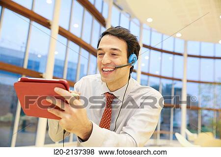 Business man with digital tablet View Large Photo Image Stock Photo - Business man with digital tablet. Fotosearch